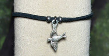 Load image into Gallery viewer, Charming Personal POWER Arm BAND-IT Black Faux Suede Cord Sparkling &quot;Peace&quot; Bird in Flight (Endings: &quot;Love/Adventure&quot;)