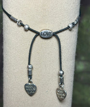 Load image into Gallery viewer, Charming POWER Arm BAND-IT Black Cord Love Hummingbird  (Made with Love Endings)