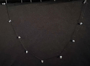 Round RSD1 Clear Round/Clear Diamonds Black unbreakable Strand