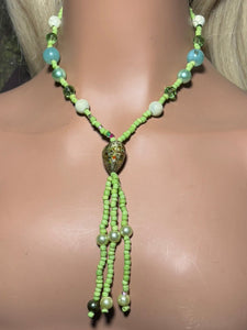 Personal POWER BAND-IT Green Glass Bead Array Fringed Large Lampworked Bead